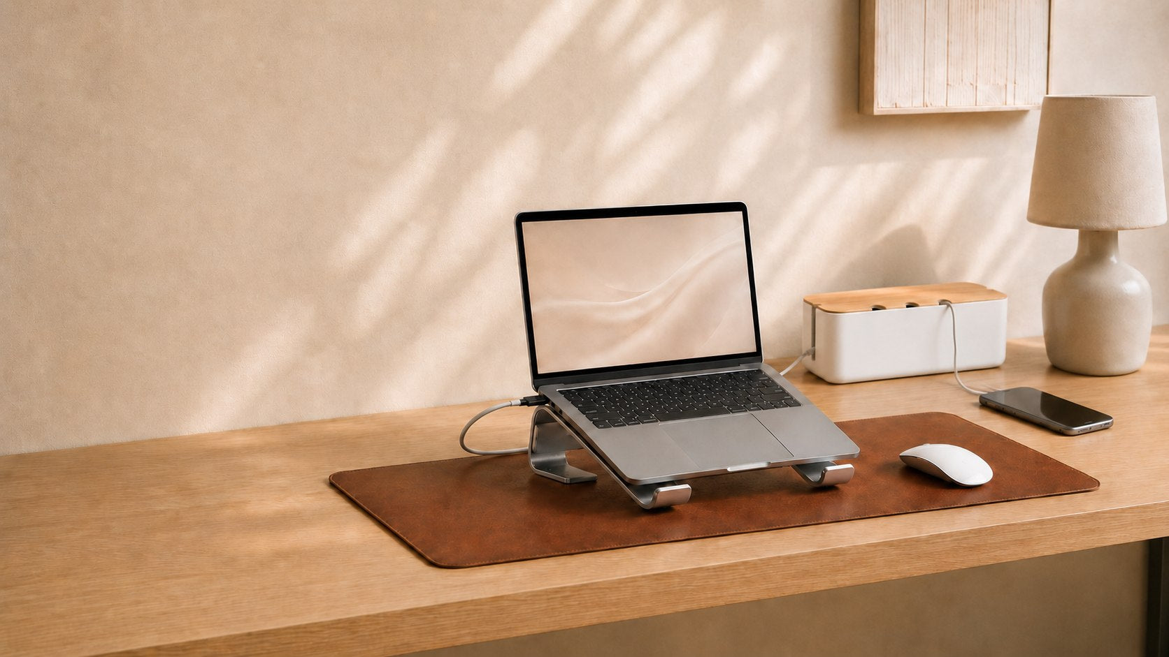 A calm home workspace featuring Opus Room desk accessories